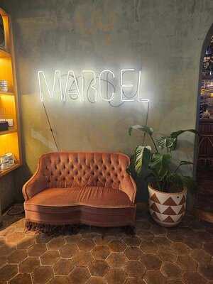 Merci Marcel Orchard