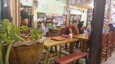 เป็ดย่างกลางปาย