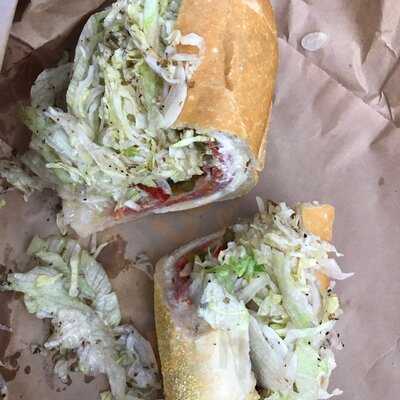 The Sandwich Man Pizza Too