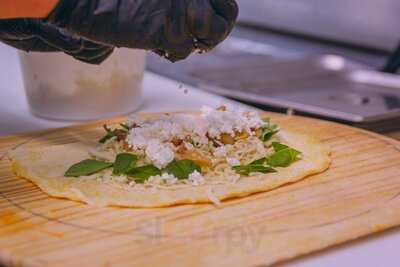 Holmes Pizza And Arcade